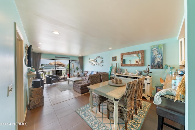 dining room with recessed lighting and tile patterned floors