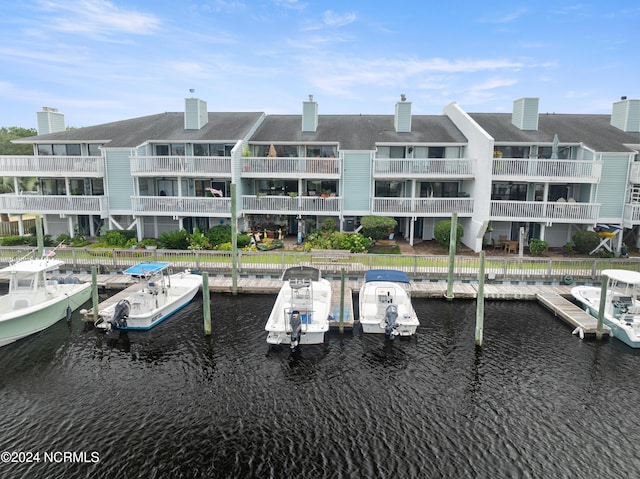 dock area featuring a water view