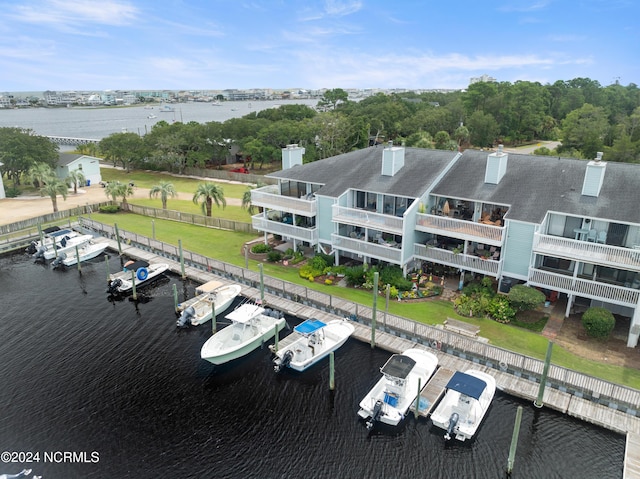 birds eye view of property featuring a water view