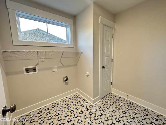 clothes washing area featuring electric dryer hookup and washer hookup