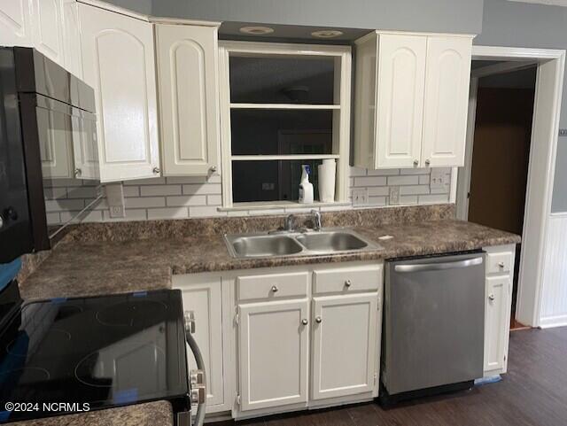 kitchen featuring white cabinetry, sink, decorative backsplash, and dishwasher