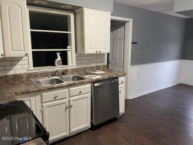 kitchen featuring white cabinetry, black / electric stove, dishwasher, and sink