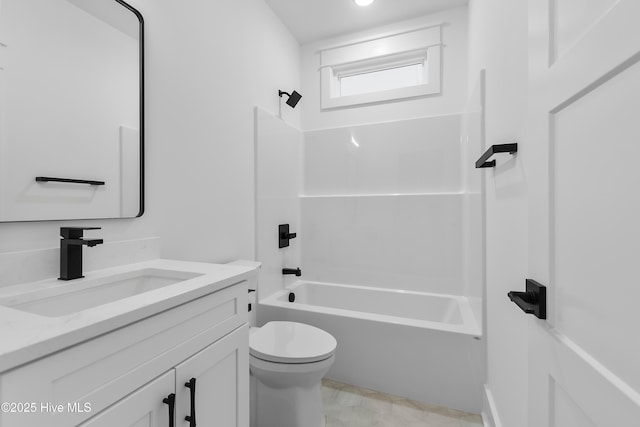 full bathroom with washtub / shower combination, toilet, and vanity