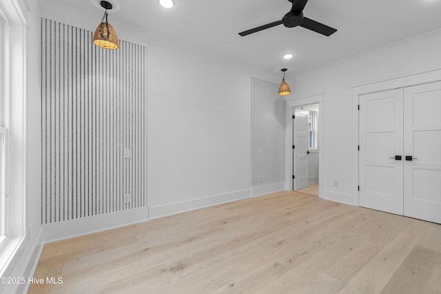 unfurnished bedroom with recessed lighting, wood finished floors, and ornamental molding