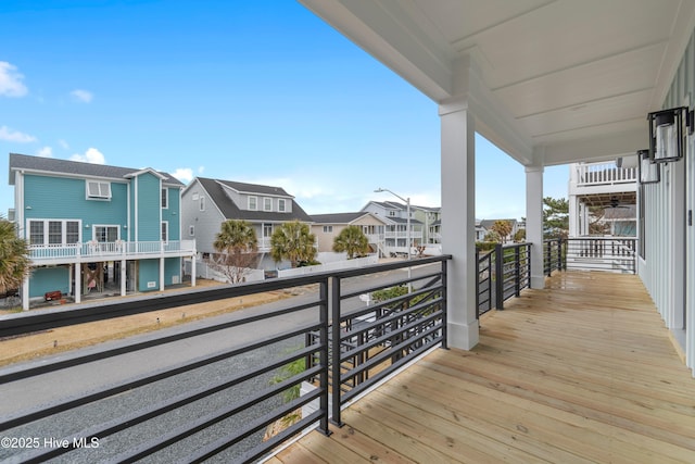 balcony featuring a residential view