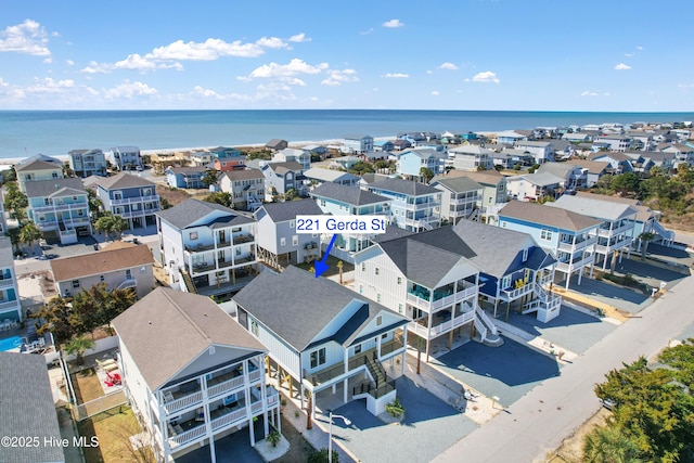 aerial view with a residential view and a water view