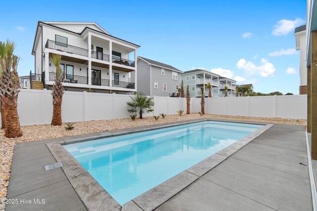 view of front of home featuring a carport