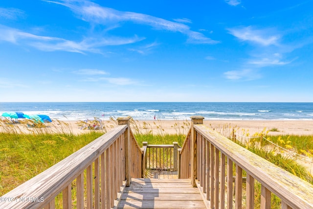 view of water feature with a beach view