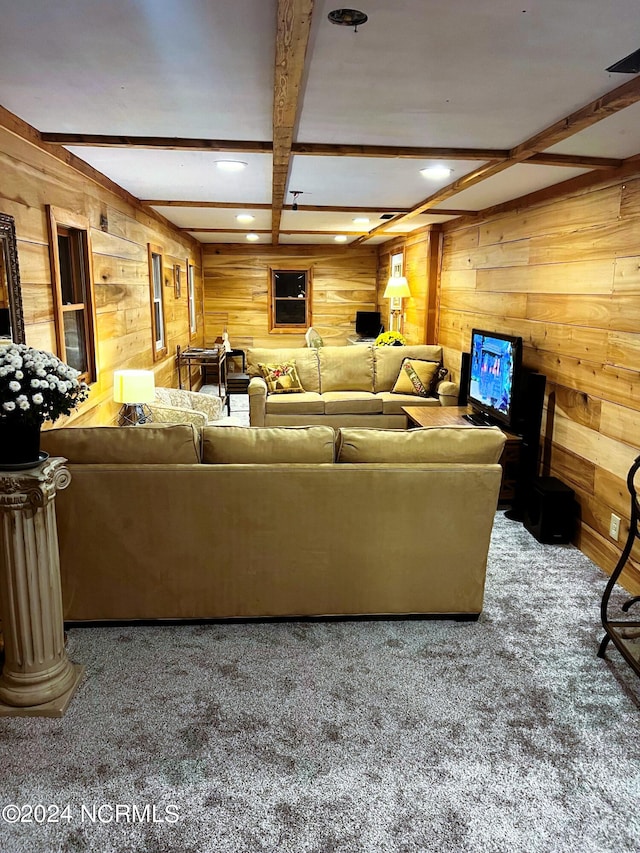 carpeted living room featuring beamed ceiling, ornate columns, and coffered ceiling