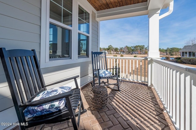 balcony featuring a porch