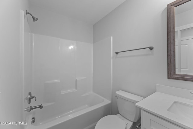 full bathroom with vanity, shower / washtub combination, and toilet