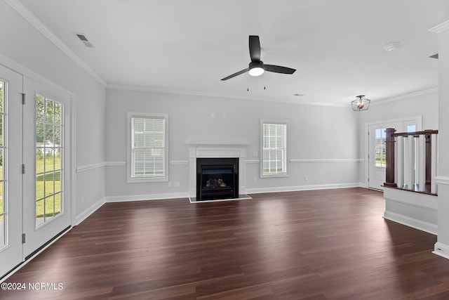 unfurnished living room with dark hardwood / wood-style flooring, plenty of natural light, and ceiling fan