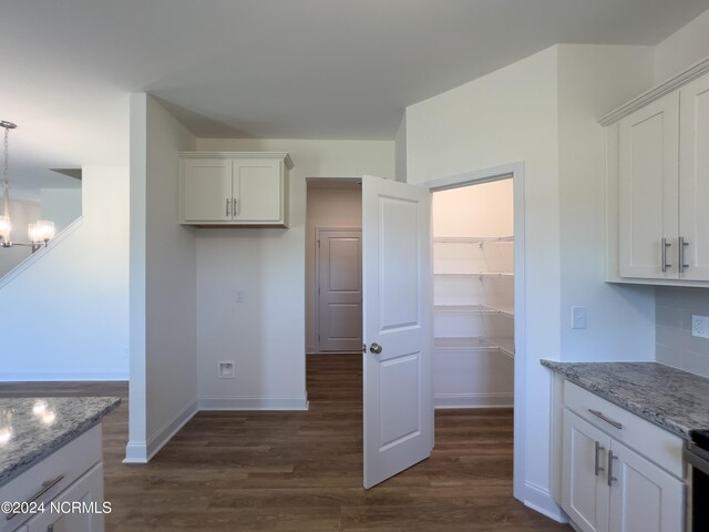 bathroom featuring vanity, hardwood / wood-style flooring, and shower with separate bathtub