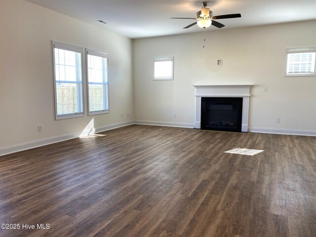 unfurnished dining area with dark hardwood / wood-style flooring and a notable chandelier