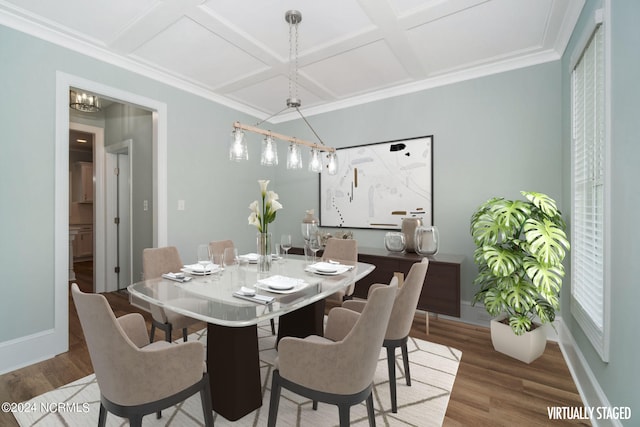 dining room with coffered ceiling, ornamental molding, a chandelier, and hardwood / wood-style flooring