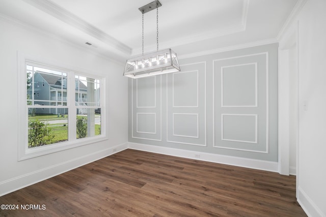 unfurnished dining area with crown molding and dark wood-type flooring