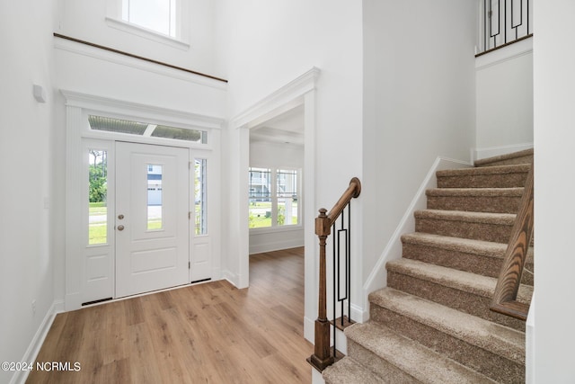 foyer with light hardwood / wood-style floors