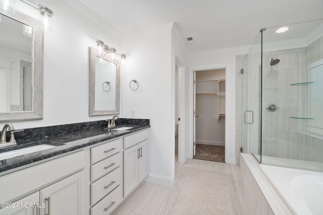 bathroom featuring vanity, independent shower and bath, and ornamental molding