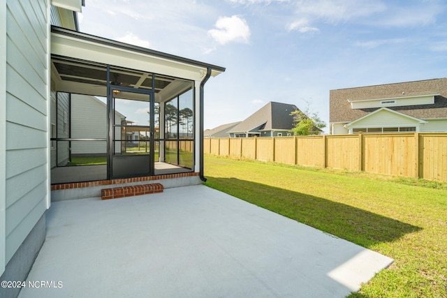 view of patio / terrace with a sunroom