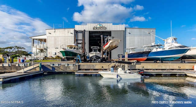 dock area with a water view