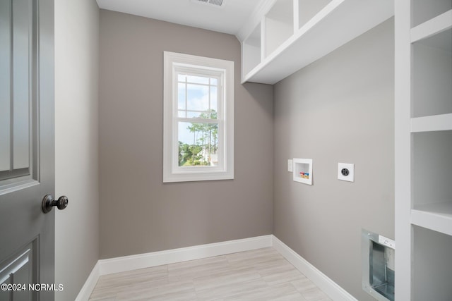 washroom featuring washer hookup, visible vents, hookup for an electric dryer, laundry area, and baseboards