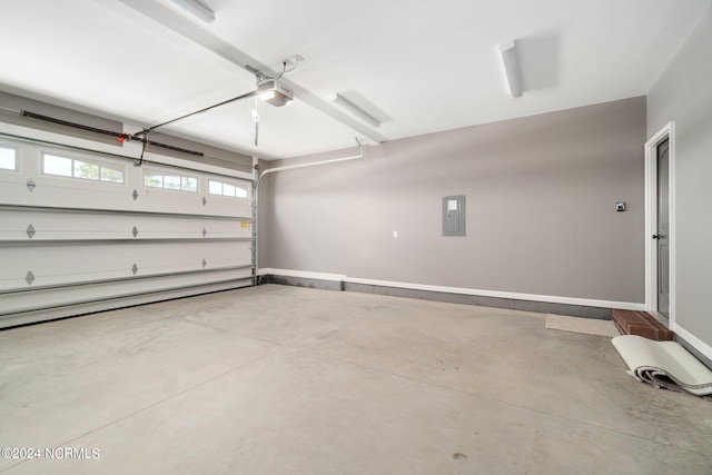 garage featuring a garage door opener and electric panel