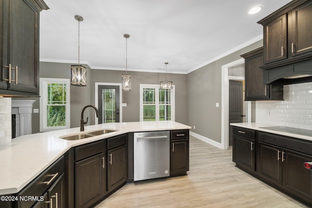 kitchen with tasteful backsplash, dishwasher, a sink, and ornamental molding