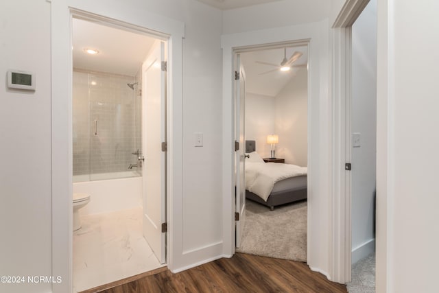 hallway featuring dark hardwood / wood-style floors