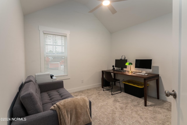 carpeted office with vaulted ceiling and ceiling fan