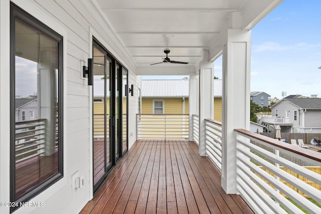 wooden deck with ceiling fan