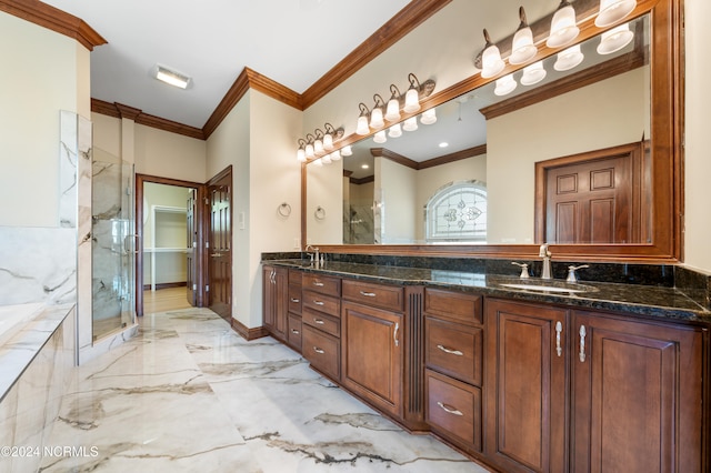 bathroom featuring vanity, crown molding, and independent shower and bath