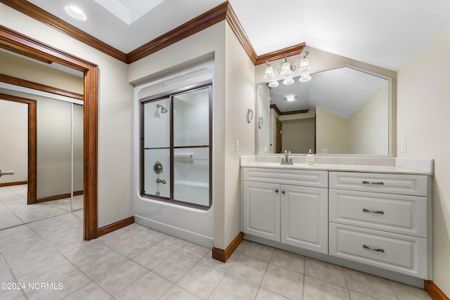 bathroom with enclosed tub / shower combo, vaulted ceiling, ornamental molding, vanity, and tile patterned flooring