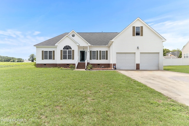 view of front facade featuring a garage and a front yard