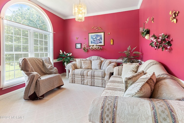 living room featuring ornamental molding, a chandelier, and carpet flooring