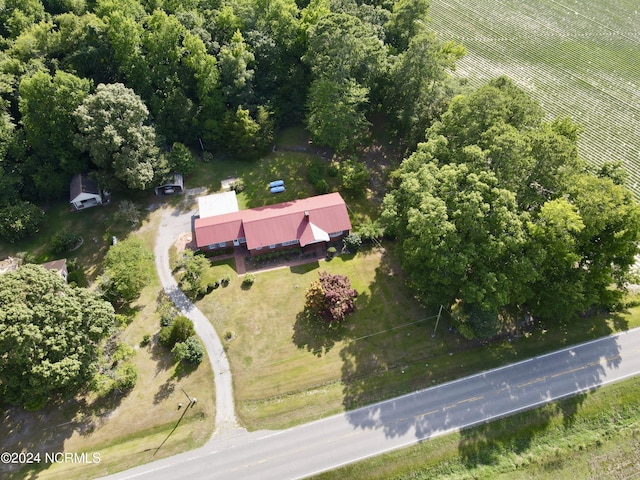 birds eye view of property with a rural view