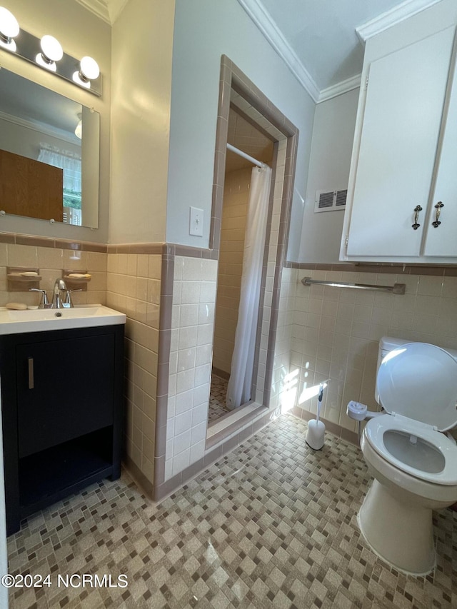 bathroom featuring crown molding, tile walls, curtained shower, and toilet