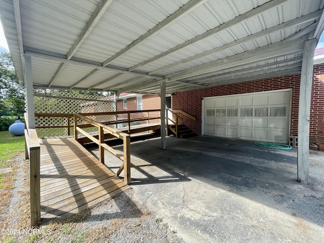 garage featuring a carport