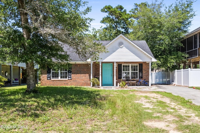 view of front of property with a front lawn