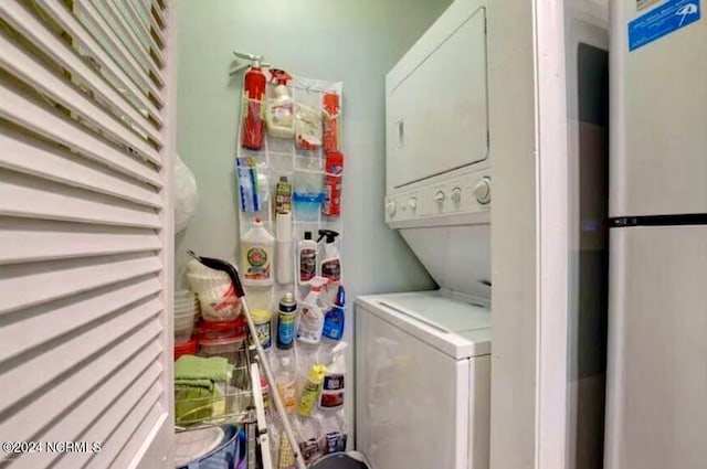 washroom with stacked washer and clothes dryer