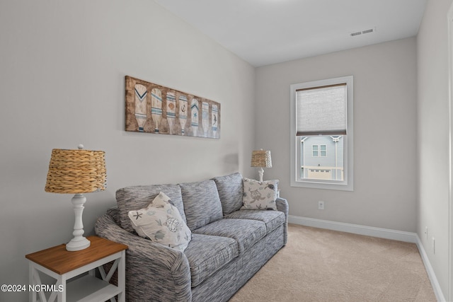 living room with light colored carpet