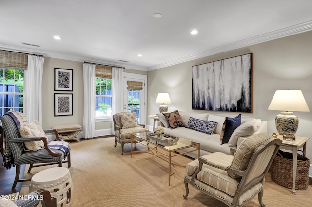 living room with plenty of natural light, crown molding, and recessed lighting