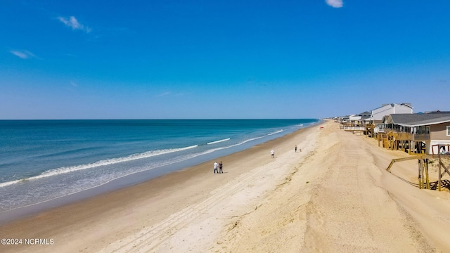 property view of water featuring a beach view