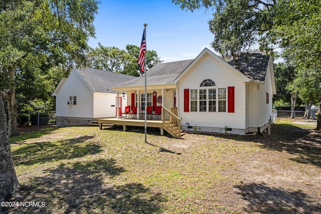 back of house with a yard