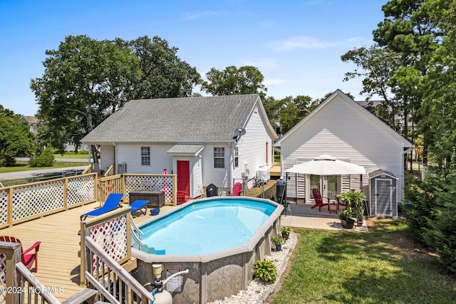 view of pool featuring a wooden deck