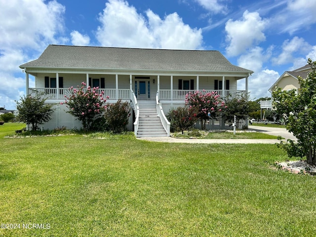 view of front of house with a porch and a front lawn