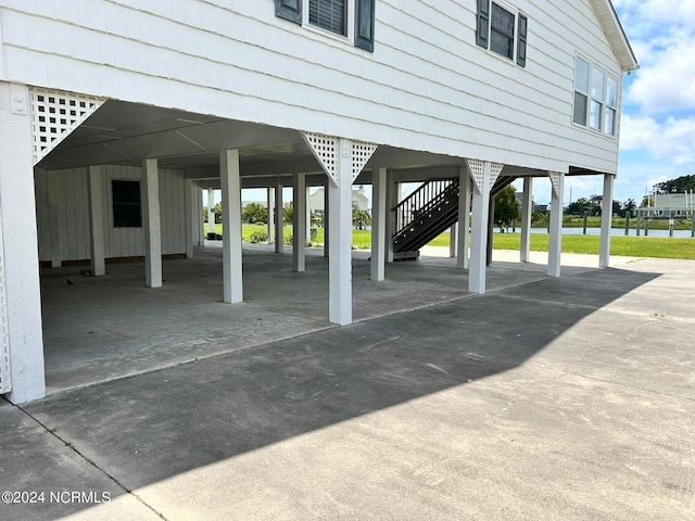 exterior space with a carport