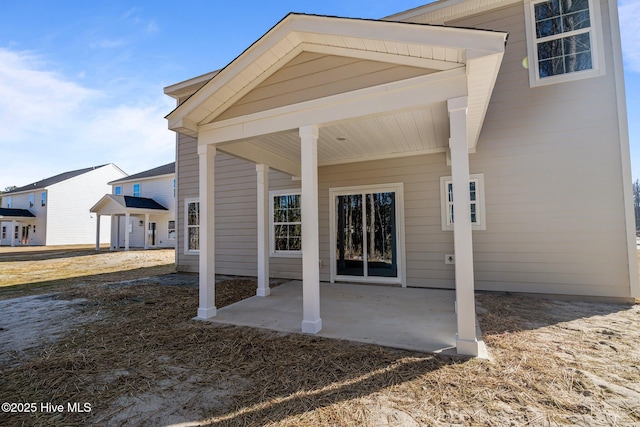 back of house with a patio area