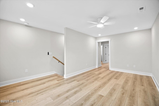 unfurnished room with light hardwood / wood-style flooring and ceiling fan