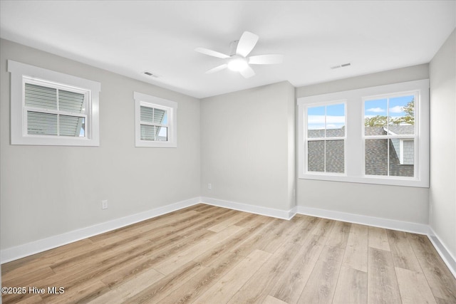 unfurnished room featuring ceiling fan and light hardwood / wood-style floors