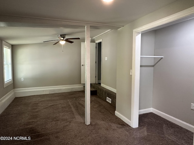 unfurnished bedroom with ceiling fan and carpet floors